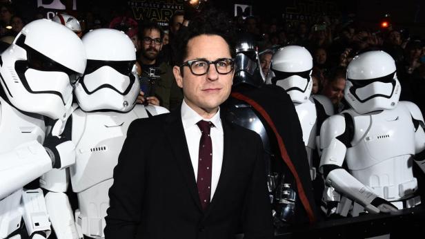 J.J. Abrams standing with stormtroopers